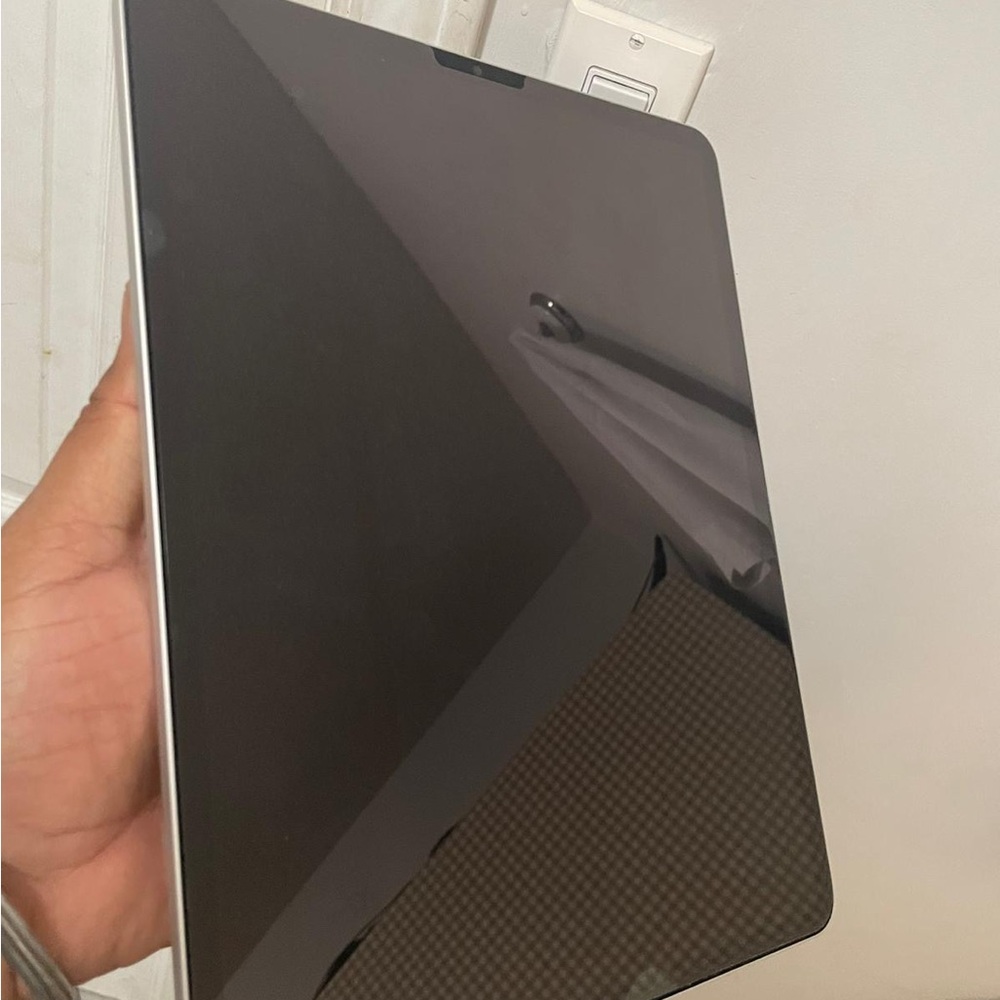 Apple Black Tablet with Sleek Design and Glossy Finish